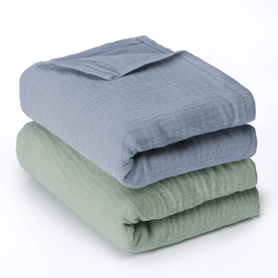 haakaa-muslin-swaddle-blankets-2-pack-47x47-inches-100-cotton-double-layer-soft- image 1