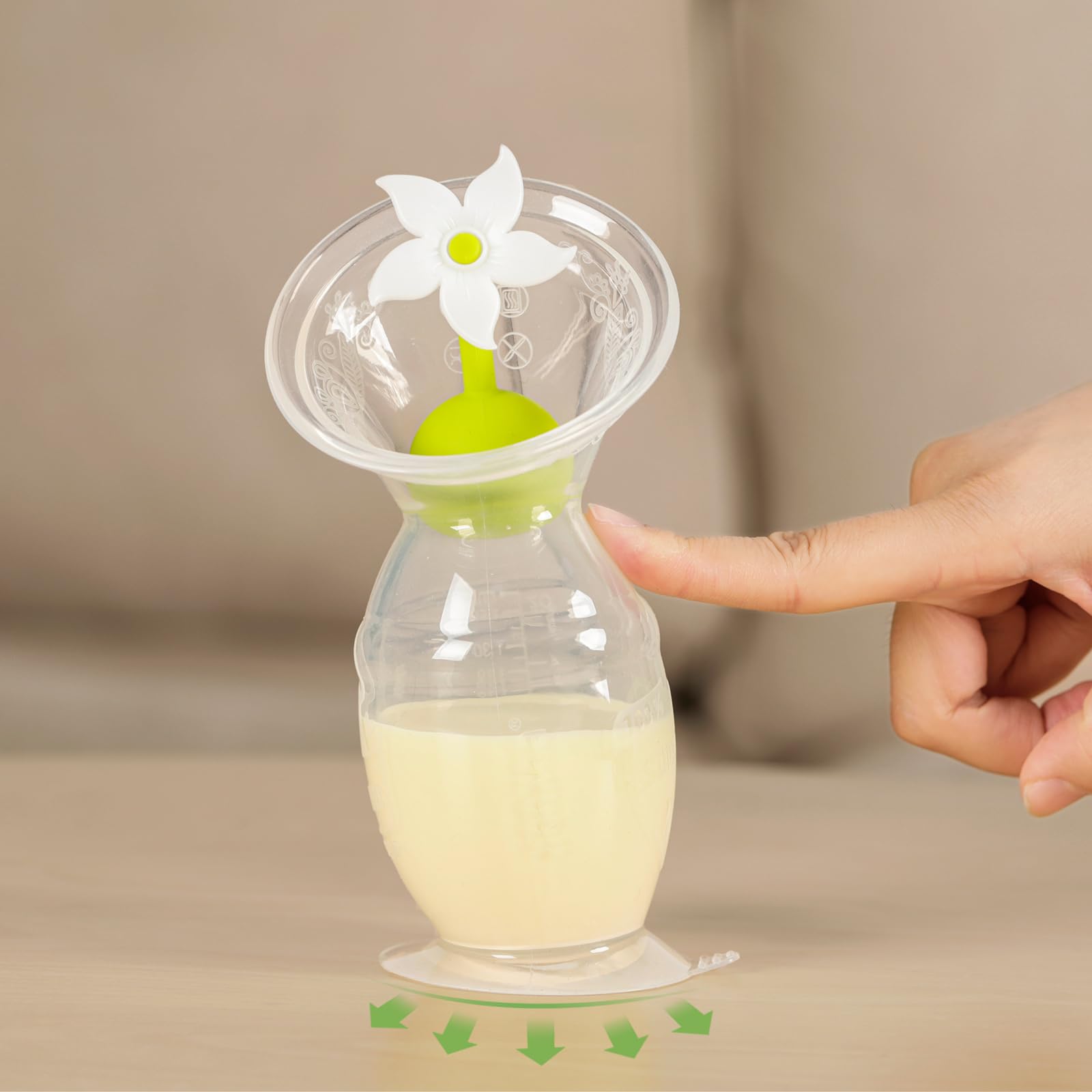 haakaa-manual-breast-pump-with-suction-base-and-flower-stopper-5oz-150ml-white image 5