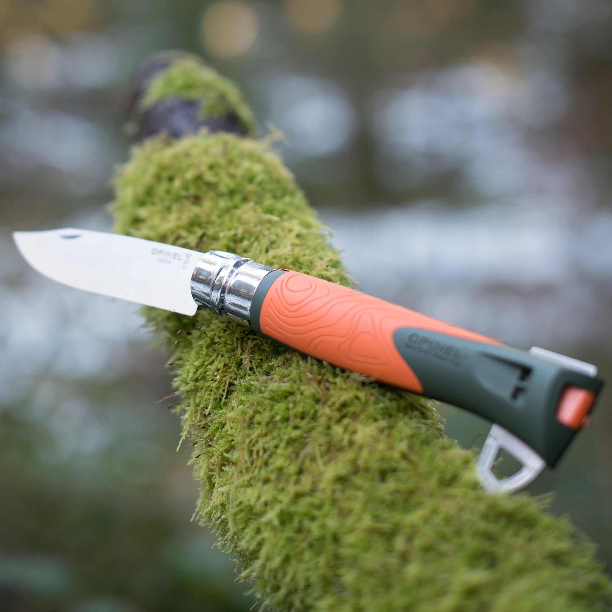 opinel-no-12-outdoor-explore-folding-knife-with-fire-starter-orange-warehouse-fi image 2