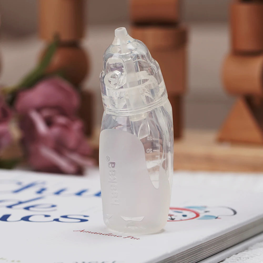 haakaa-silicone-penguin-nasal-aspirator-pack-of-4-dual-valve-2-tip-sizes-food-gr image 2